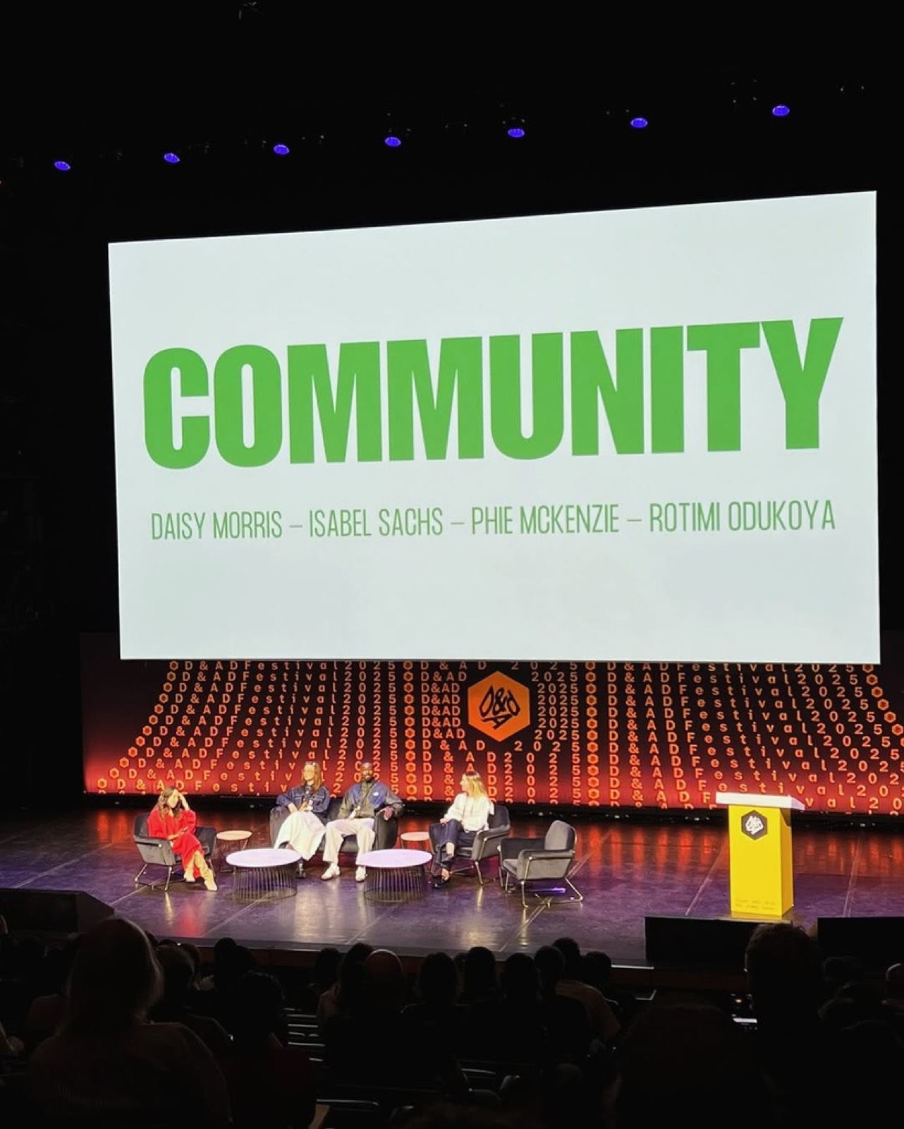 Phie McKenzie speaking on stage at D&AD