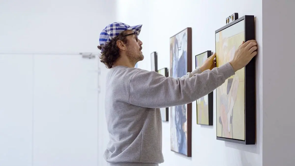 Trevor Read hanging work at Adorn The Common
